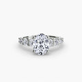 The Graduated Accent Ring in white gold with an oval centre stone