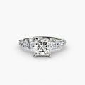 The Graduated Accent Ring in white gold with a princess-cut centre stone