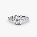 The Graduated Accent Ring in white gold with a radiant-cut centre stone