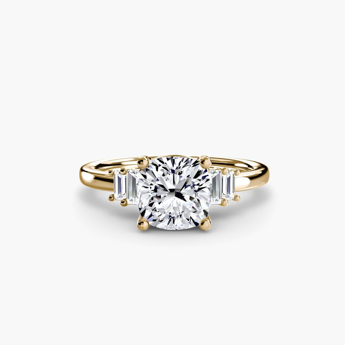 Baguette Accent Solitaire engagement ring in yellow gold with a cushion-cut centre stone