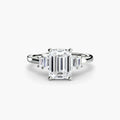 Baguette Accent Solitaire engagement ring in white gold with an emerald-cut centre stone