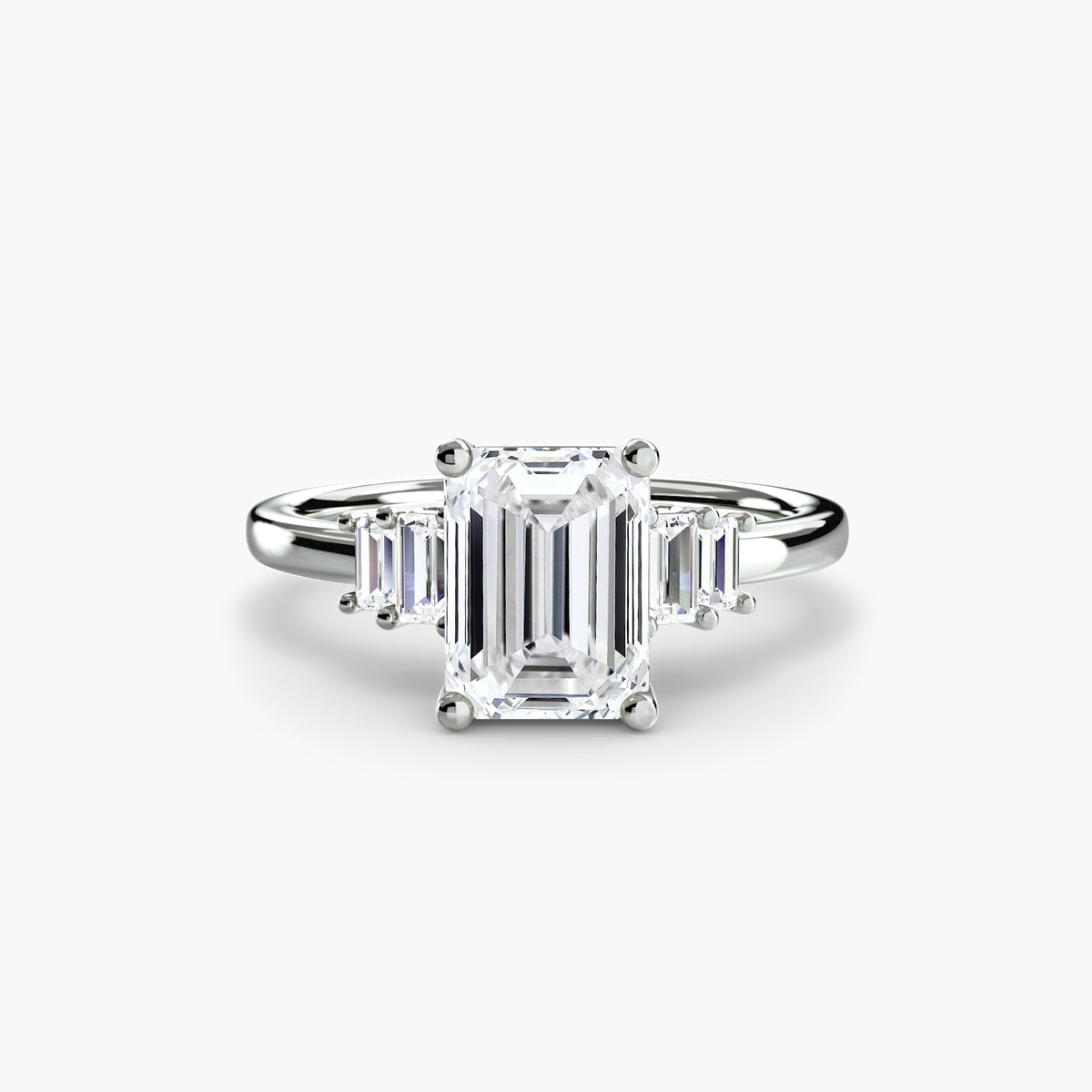 Baguette Accent Solitaire engagement ring in white gold with an emerald-cut centre stone