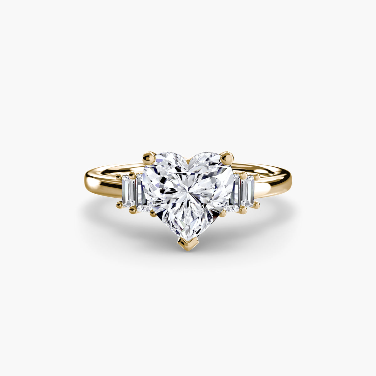 Baguette Accent Solitaire engagement ring in yellow gold with a heart-shaped centre stone