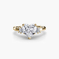 Baguette Accent Solitaire engagement ring in yellow gold with a heart-shaped centre stone