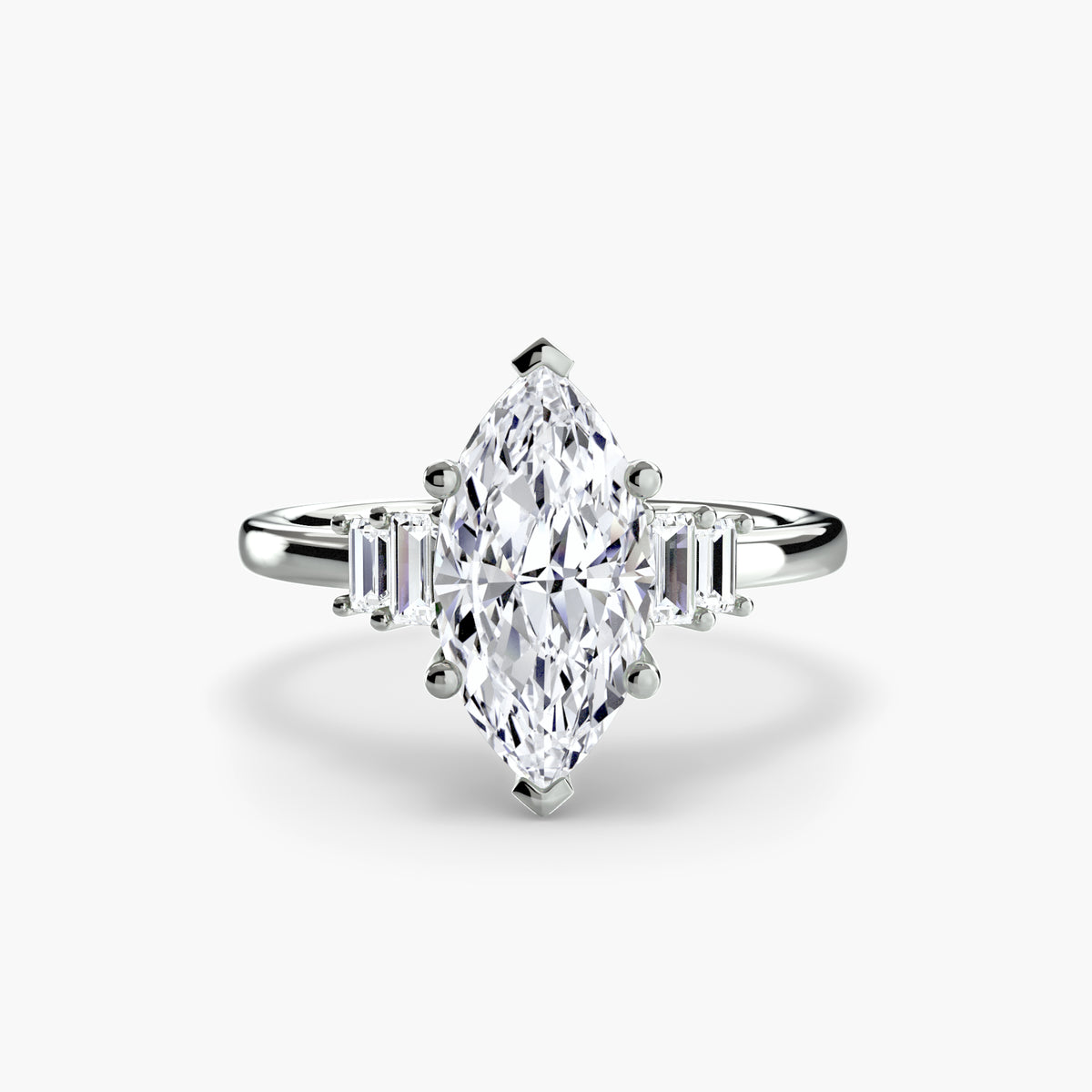 Baguette Accent Solitaire engagement ring in white gold with a marquise centre stone