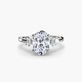 Baguette Accent Solitaire engagement ring in white gold with an oval centre stone