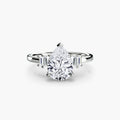 Baguette Accent Solitaire engagement ring in white gold with a pear-shaped centre stone