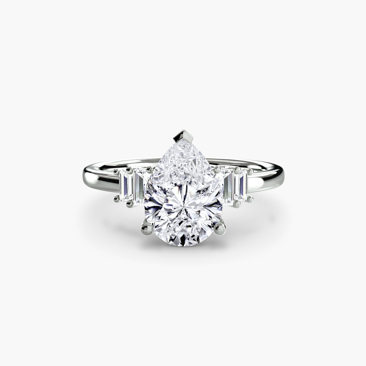 Baguette Accent Solitaire engagement ring in white gold with a pear-shaped centre stone