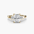 Baguette Accent Solitaire engagement ring in yellow gold with a radiant-cut centre stone
