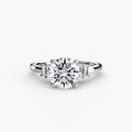 Baguette Accent Solitaire engagement ring in white gold with a round centre stone
