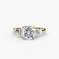 Baguette Accent Solitaire engagement ring in yellow gold