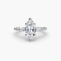 The Tiered Accent Ring in white gold with a marquise centre stone