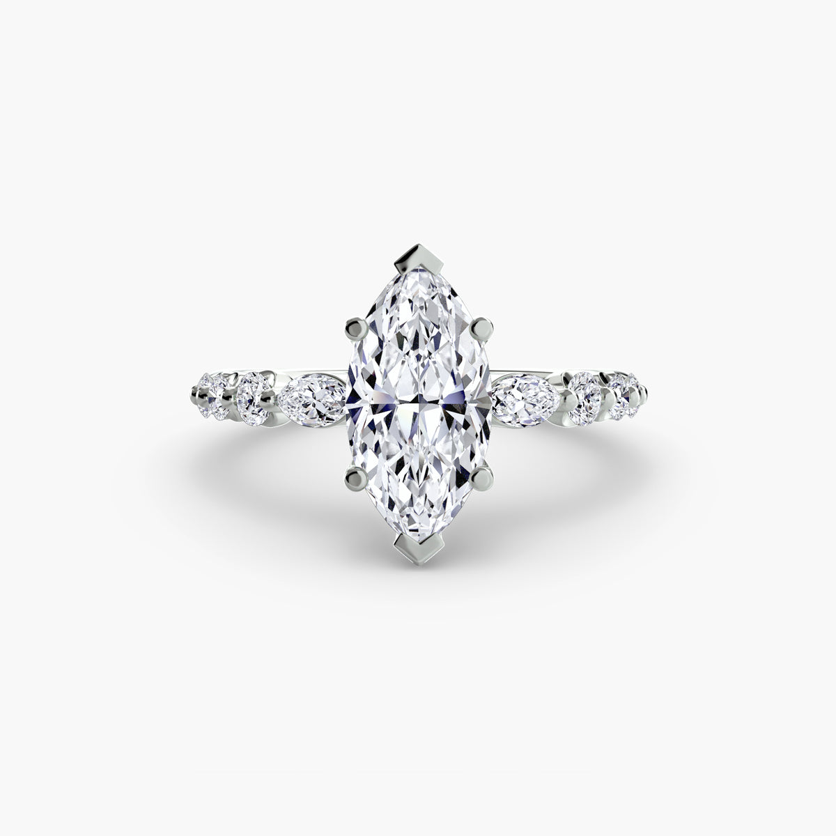 The Tiered Accent Ring in white gold with a marquise centre stone