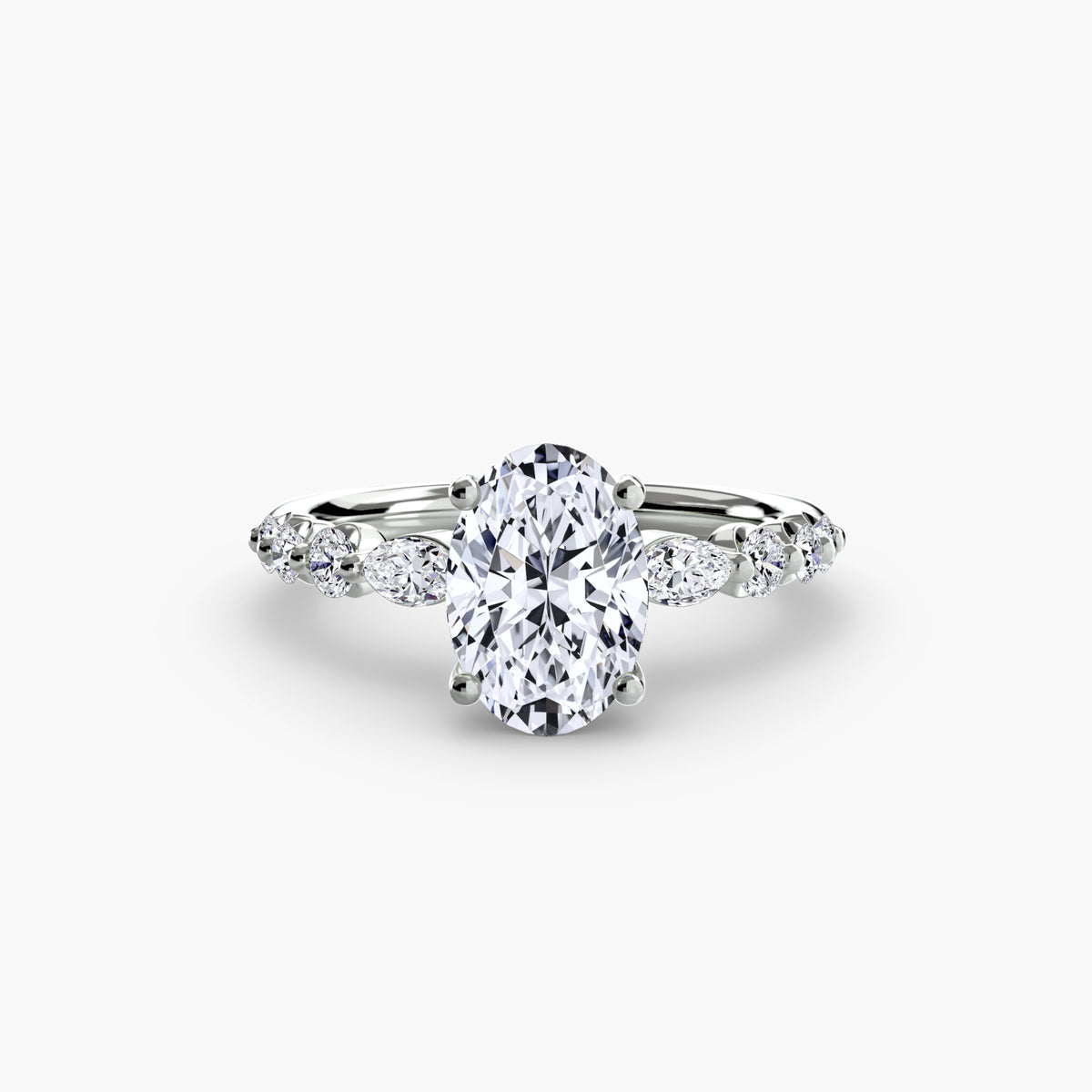 The Tiered Accent Ring in white gold with an oval centre stone