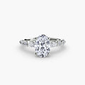 The Tiered Accent Ring in white gold with an oval centre stone