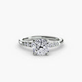Solitaire with Shoulder Accents engagement ring in white gold with a cushion-cut centre stone