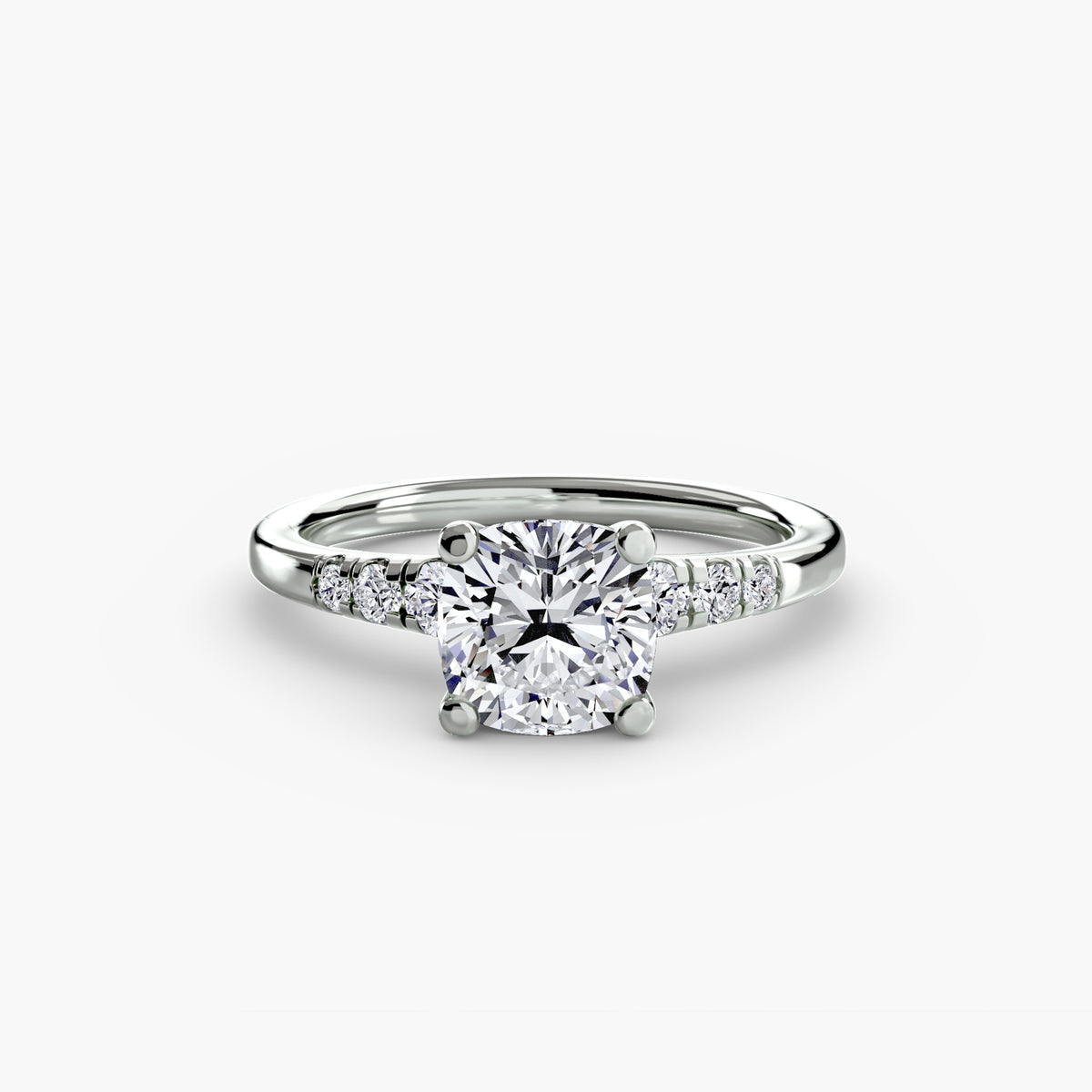 Solitaire with Shoulder Accents engagement ring in white gold with a cushion-cut centre stone