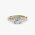 Solitaire with Shoulder Accents engagement ring in yellow gold with a cushion-cut centre stone