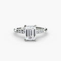 Solitaire with Shoulder Accents engagement ring in white gold with an emerald-cut centre stone
