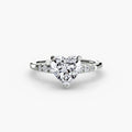 Solitaire with Shoulder Accents engagement ring in white gold with a heart-shaped centre stone