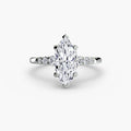Solitaire with Shoulder Accents engagement ring in white gold with a marquise centre stone
