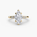 Solitaire with Shoulder Accents engagement ring in yellow gold with a marquise centre stone