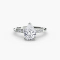 Solitaire with Shoulder Accents engagement ring in white gold with a pear-shaped centre stone