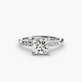 Solitaire with Shoulder Accents engagement ring in white gold with a princess-cut centre stone