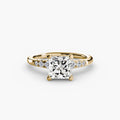 Solitaire with Shoulder Accents engagement ring in yellow gold with a princess-cut centre stone
