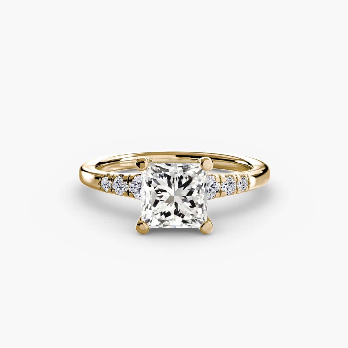 Solitaire with Shoulder Accents engagement ring in yellow gold with a princess-cut centre stone