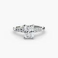 Solitaire with Shoulder Accents engagement ring in white gold with a radiant-cut centre stone