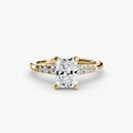 Solitaire with Shoulder Accents engagement ring in yellow gold with a radiant-cut centre stone