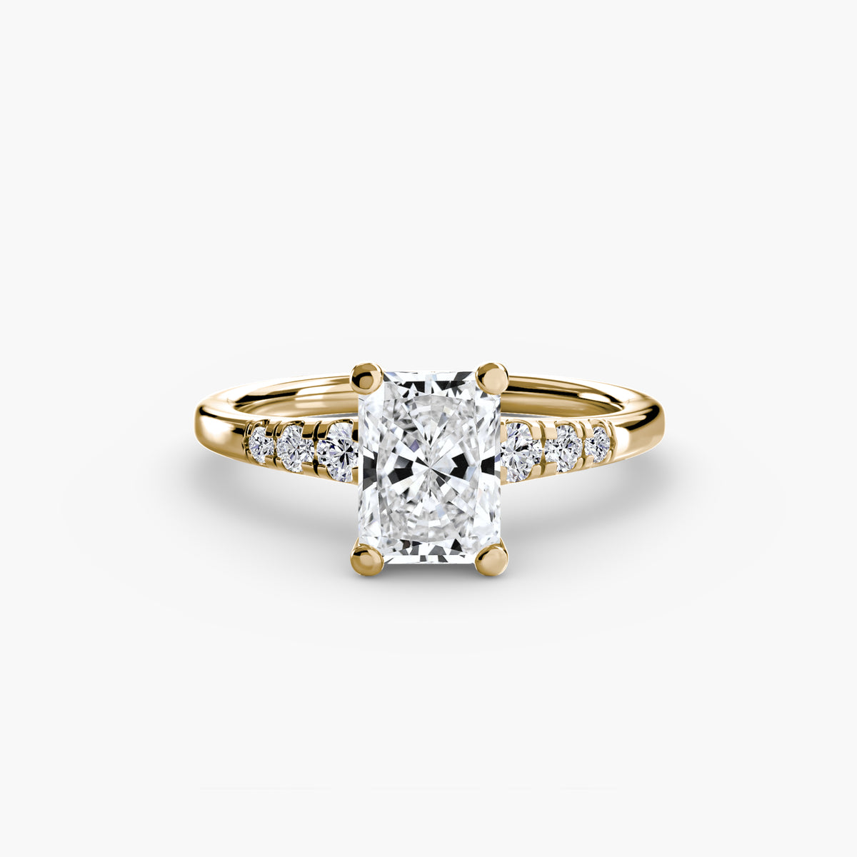 Solitaire with Shoulder Accents engagement ring in yellow gold with a radiant-cut centre stone