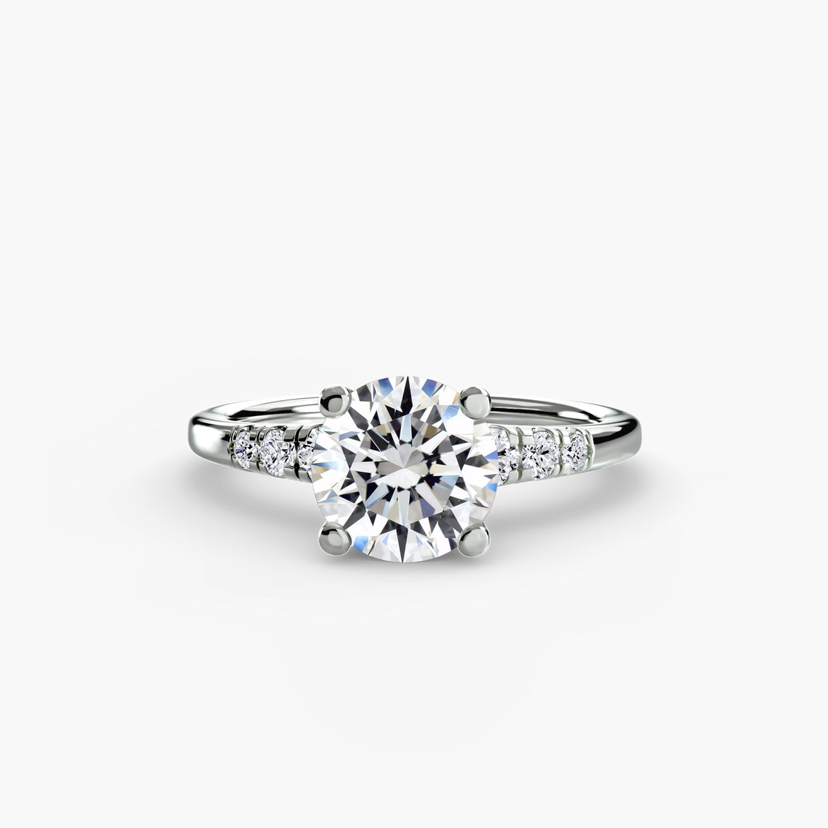 Solitaire with Shoulder Accents engagement ring in white gold