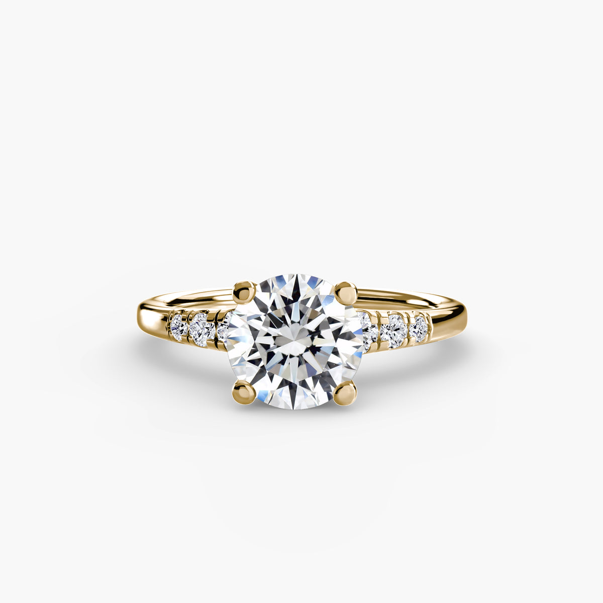 Solitaire with Shoulder Accents engagement ring in yellow gold
