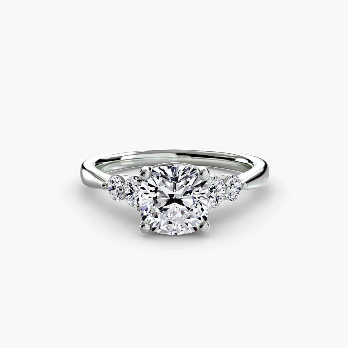 Solitaire with Shoulder Accents engagement ring in white gold with a cushion-cut centre stone