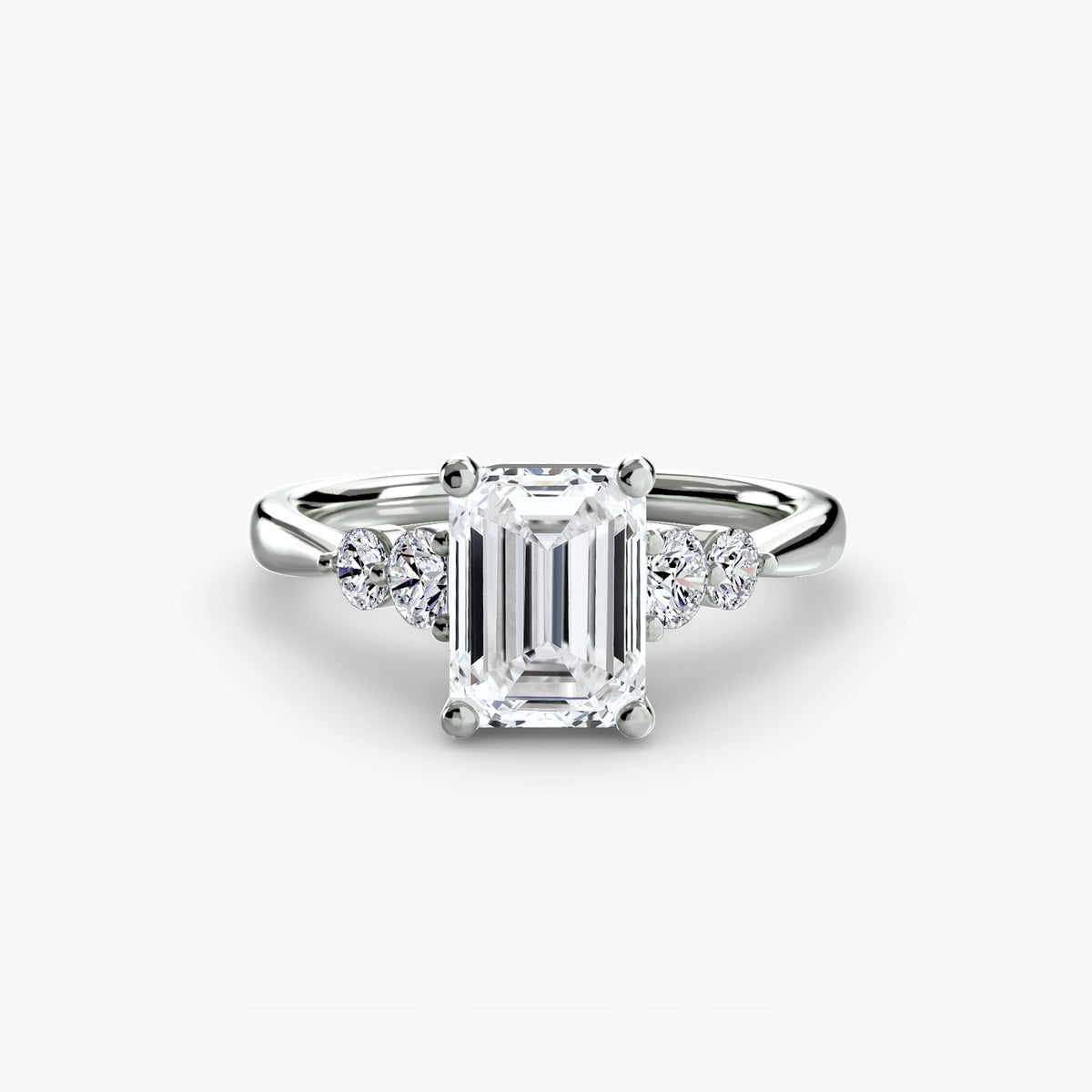 Solitaire with Shoulder Accents engagement ring in white gold with an emerald-cut centre stone