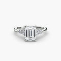 Solitaire with Shoulder Accents engagement ring in white gold with an emerald-cut centre stone