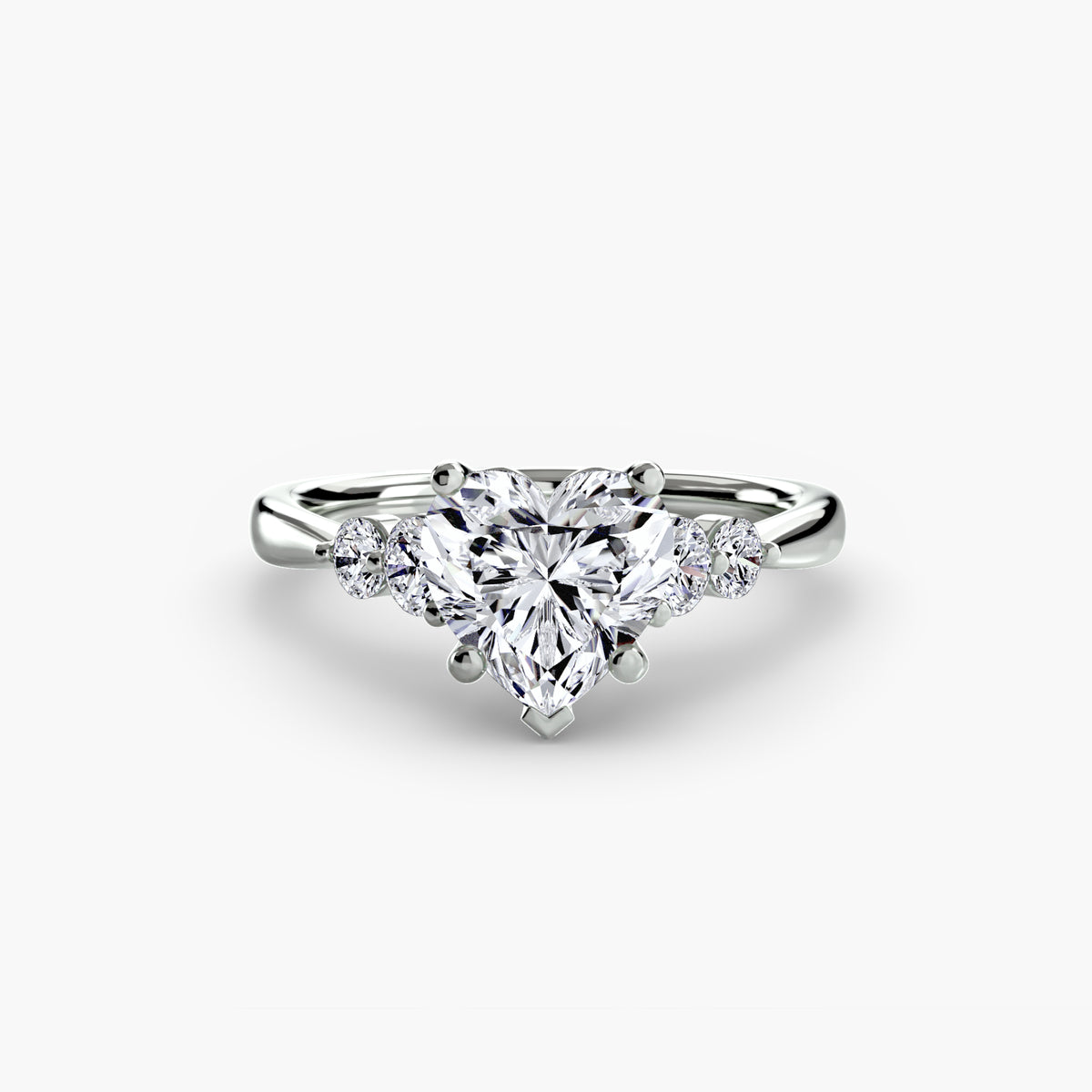Solitaire with Shoulder Accents engagement ring in white gold with a heart-shaped centre stone