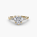 Solitaire with Shoulder Accents engagement ring in yellow gold with a heart-shaped centre stone
