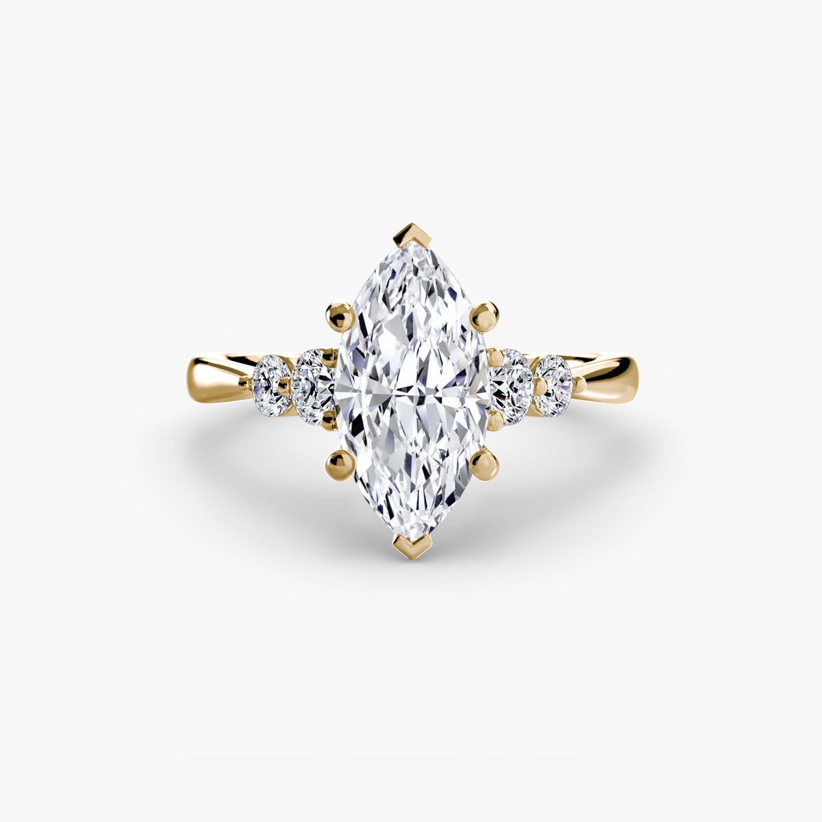 Solitaire with Shoulder Accents engagement ring in yellow gold with a marquise centre stone