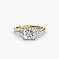 Solitaire with Shoulder Accents engagement ring in yellow gold with a princess-cut centre stone