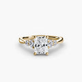Solitaire with Shoulder Accents engagement ring in yellow gold with a radiant-cut centre stone