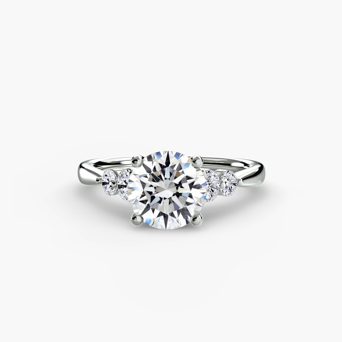 Solitaire with Shoulder Accents engagement ring in white gold