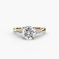 Solitaire with Shoulder Accents engagement ring in yellow gold