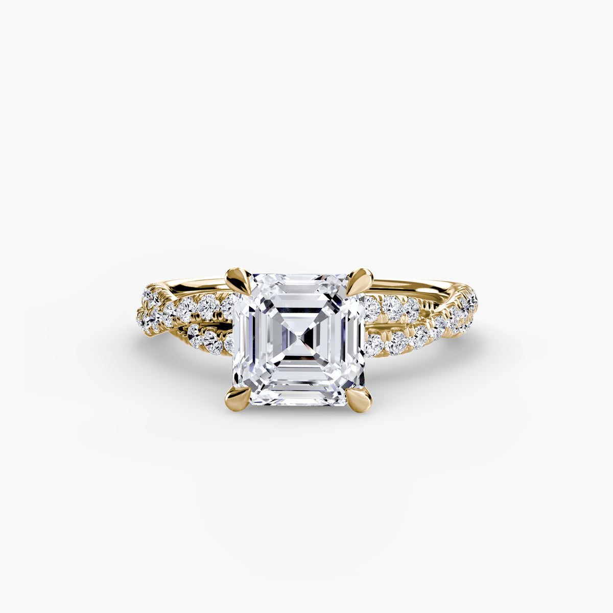 The Twisted Pavé Solitaire engagement ring in yellow gold with an Asscher-cut centre stone