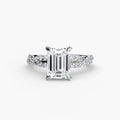 The Twisted Pavé Solitaire engagement ring in white gold with an emerald-cut centre stone