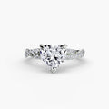 The Twisted Pavé Solitaire engagement ring in white gold with a heart-shaped centre stone