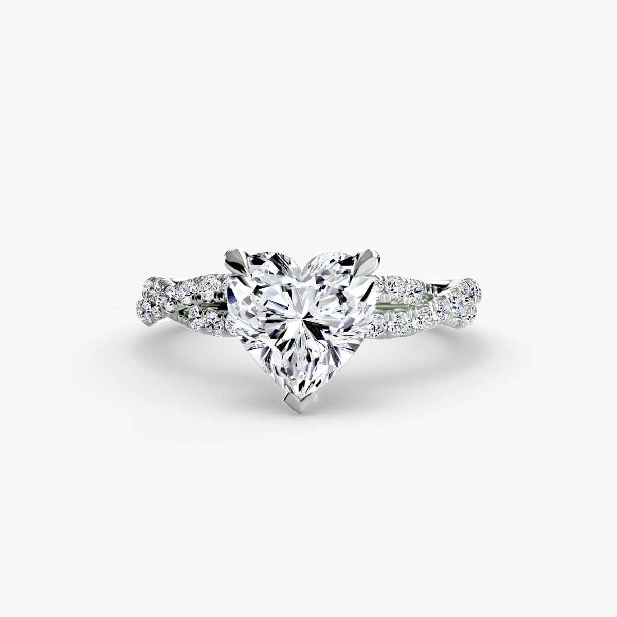The Twisted Pavé Solitaire engagement ring in white gold with a heart-shaped centre stone