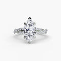 The Twisted Pavé Solitaire engagement ring in white gold with a marquise centre stone